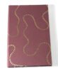 Handmade recycled paper with maroon color sheets sequence work notebook