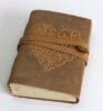 Heart embossed leather journal inside 120 sheets.